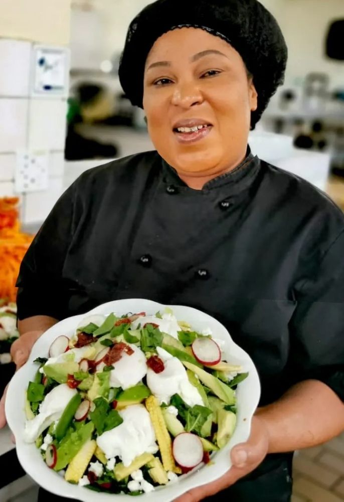 Chef holding a salad bowl